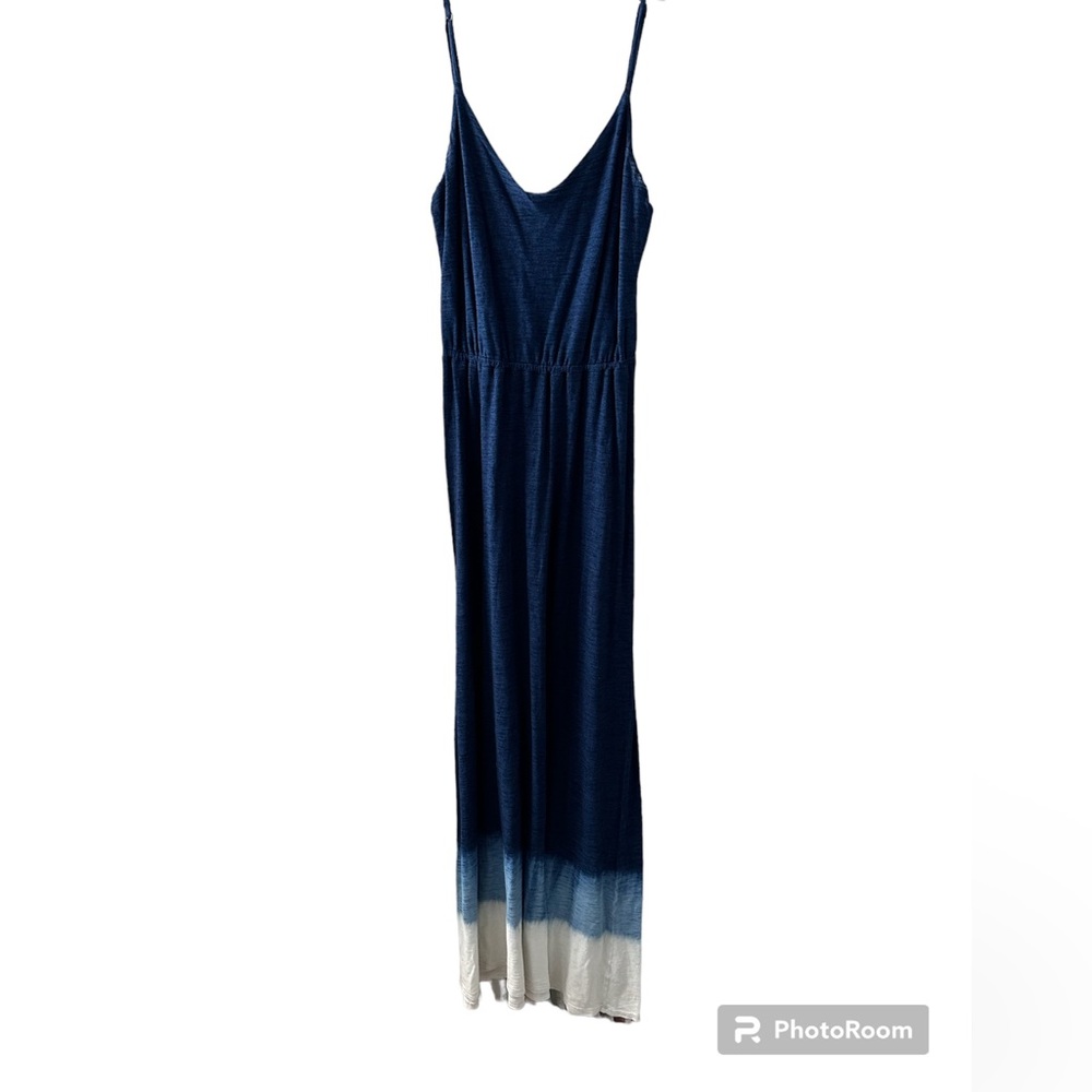 Long blue dress with tie dye bottom.